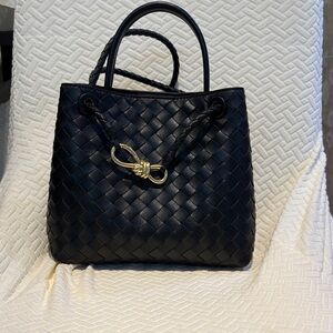 Chic Black Woven Tote with Gold Accent